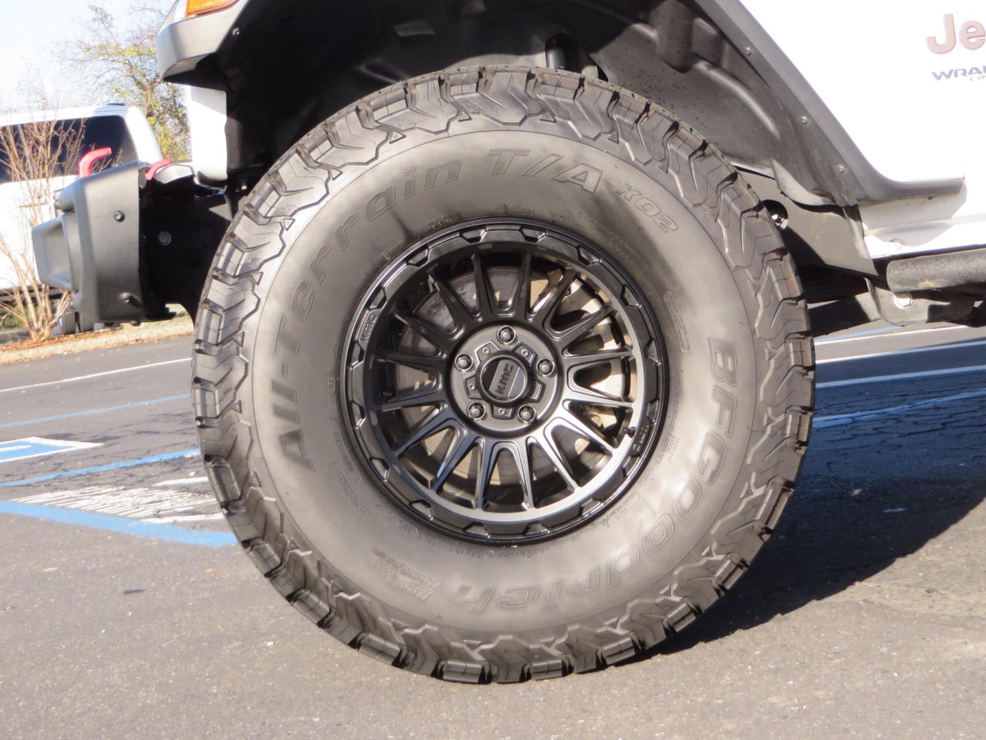2020 White /TAN Jeep Wrangler Unlimited Rubicon (1C4HJXFG8LW) with an 3.6L V6 DOHC 24V FFV engine, 6A transmission, located at 2630 Grass Valley Highway, Auburn, CA, 95603, (530) 508-5100, 38.937893, -121.095482 - 3" Zone offroad suspension system, Fox adventure series shocks, rocksliders, Teraflex HD tire relocation, Mopar HD tailgate hinge, 17" KMC wheels, and 37" BFG KO2 tires. - Photo#8